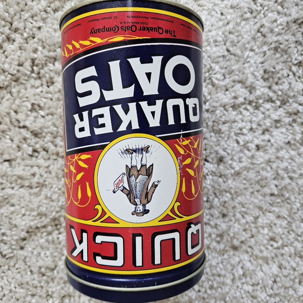 Quaker Oats Tin.  9 Inches Tall.